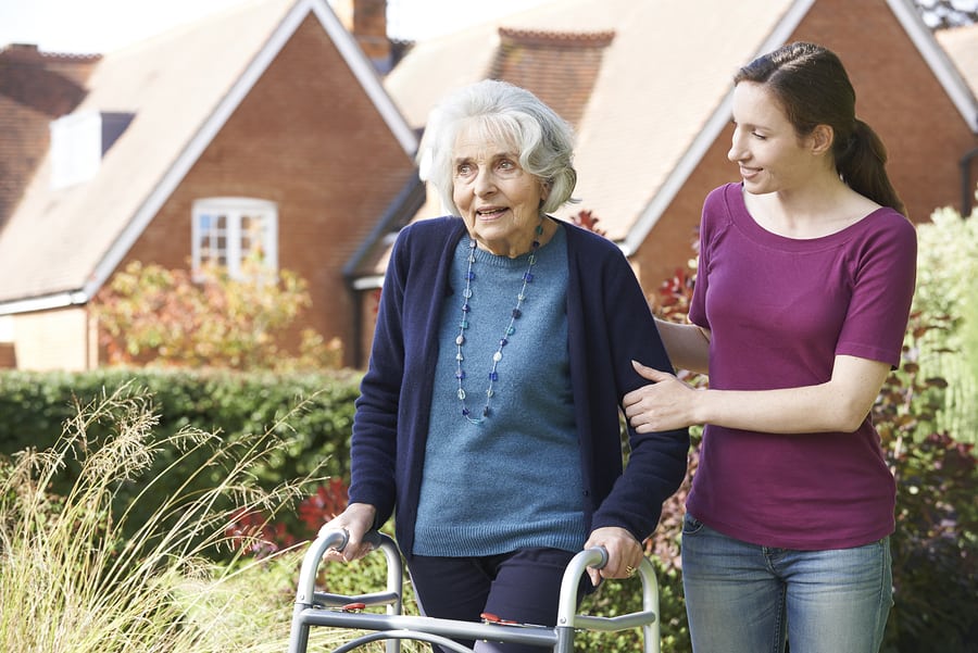 Daughter Helping Senior Mother To Use Walking Frame in Glenolden, PA Daughter Helping Senior Mother To Use Walking Frame in Glenolden, PA