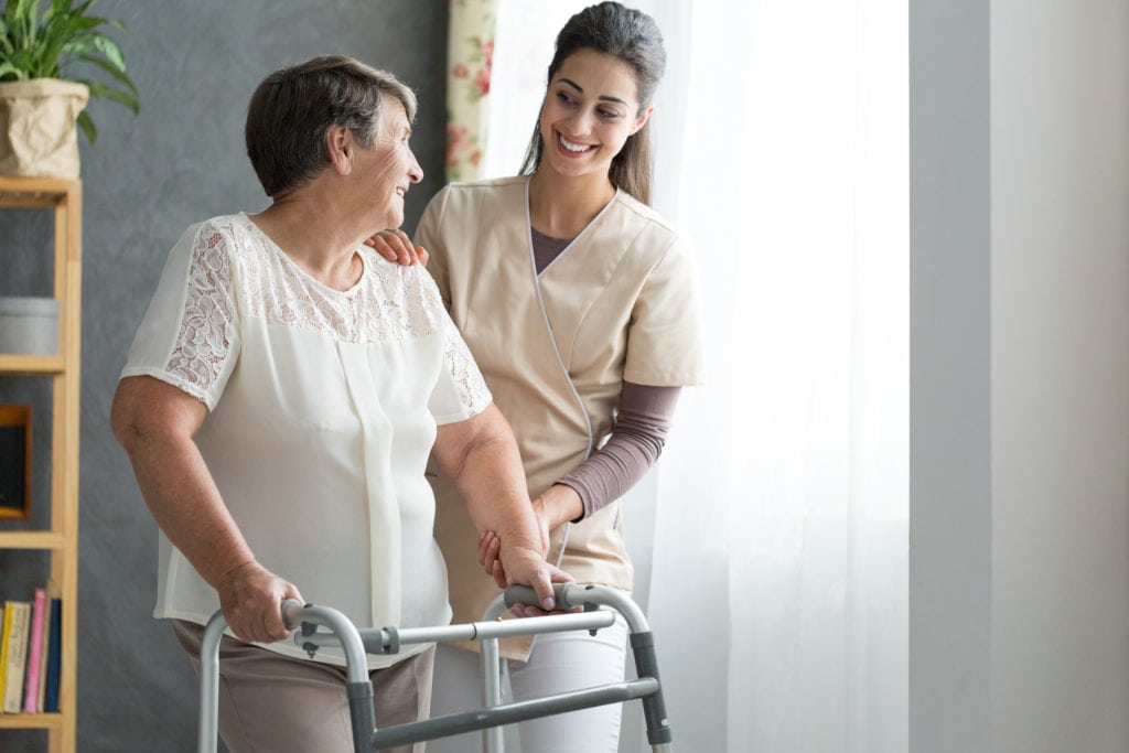 Nurse Helping Senior To Walk in Glenolden, PA Nurse Helping Senior To Walk in Glenolden, PA