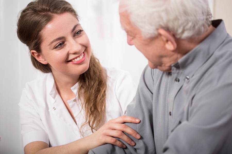 Smiling Nurse Assisting Senior Man in Berwyn, PA Smiling Nurse Assisting Senior Man in Berwyn, PA